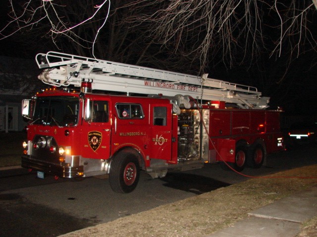 Squirt 1631 being used during overhaul at a house fire on Pageant Lane